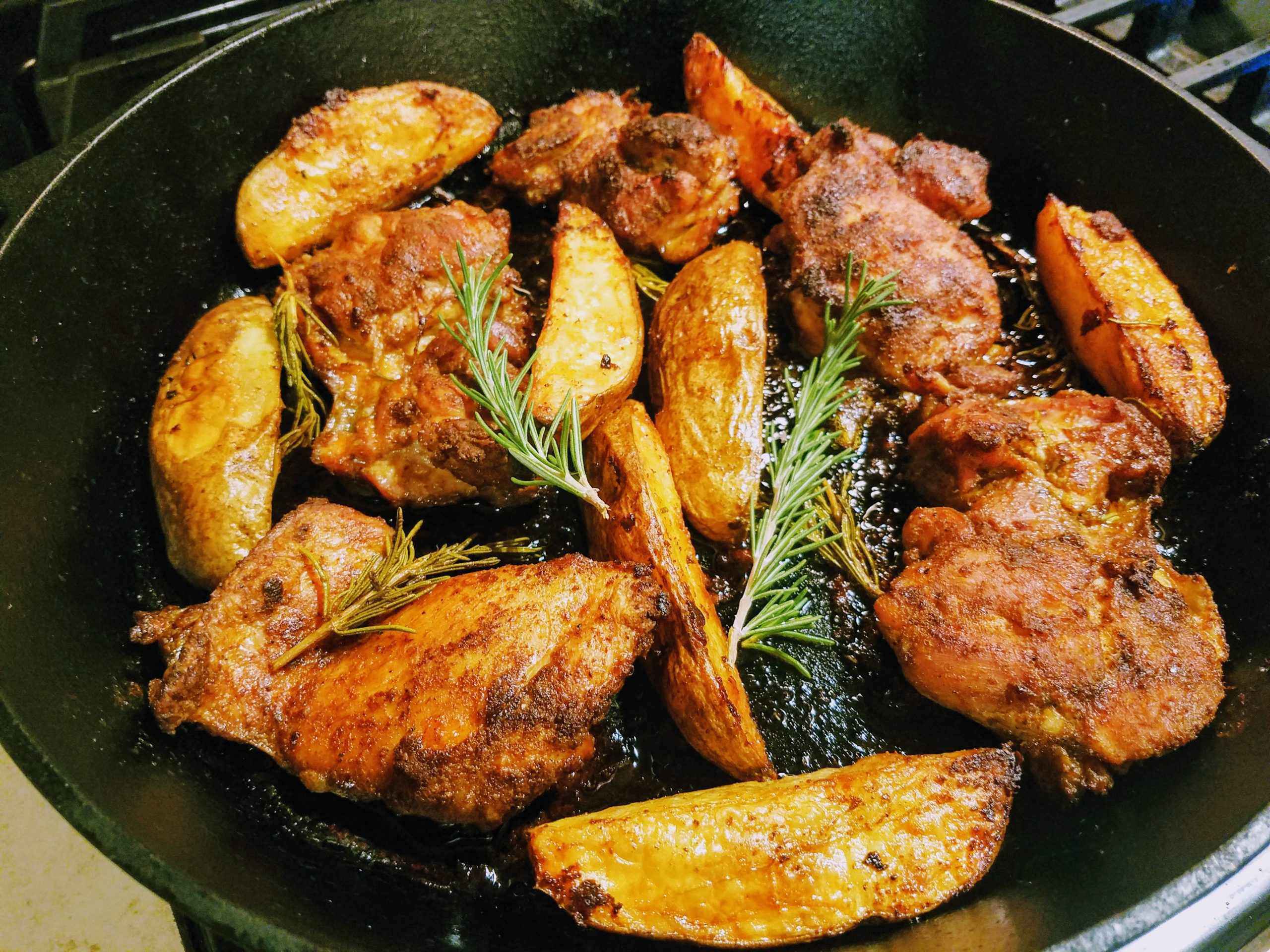 Baked and Slightly Spiced Dry Rub Chicken Thighs and Crispy Potatoes